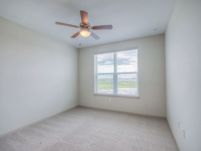 San Mateo Apartments Kissimmee Florida bedroom with carpet, ceiling fan