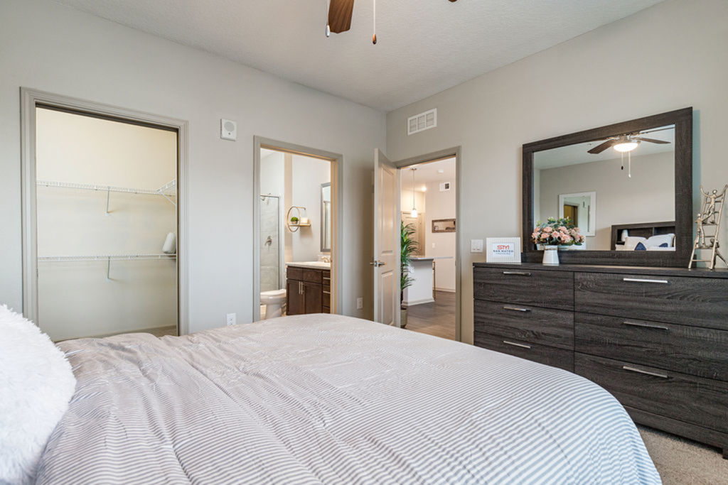 San Mateo Apartments Kissimmee Florida master bedroom with walk-in closet and on-suite bathroom