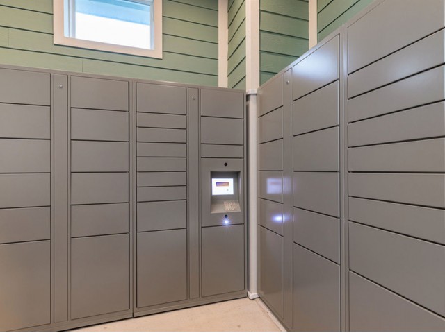 San Mateo Apartments Kissimmee Florida outdoor mail room with electronic package system