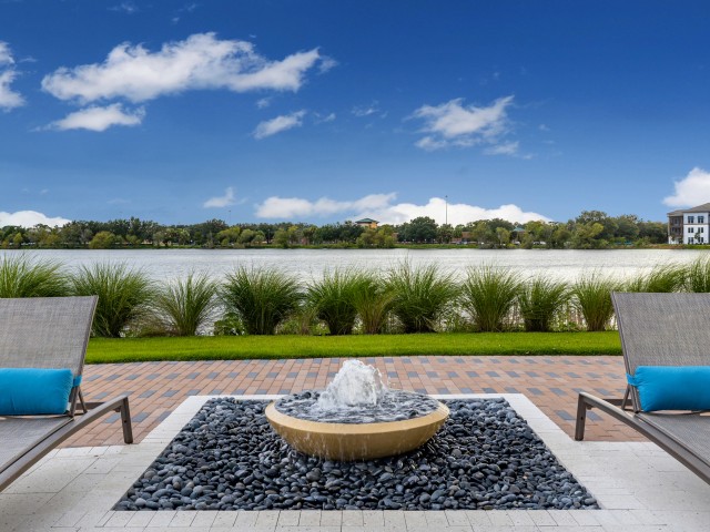 Ridgelake | Fountain and Chairs by Lake