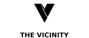 Sleek logo design of The Vicinity featuring a bold, modern V shape.