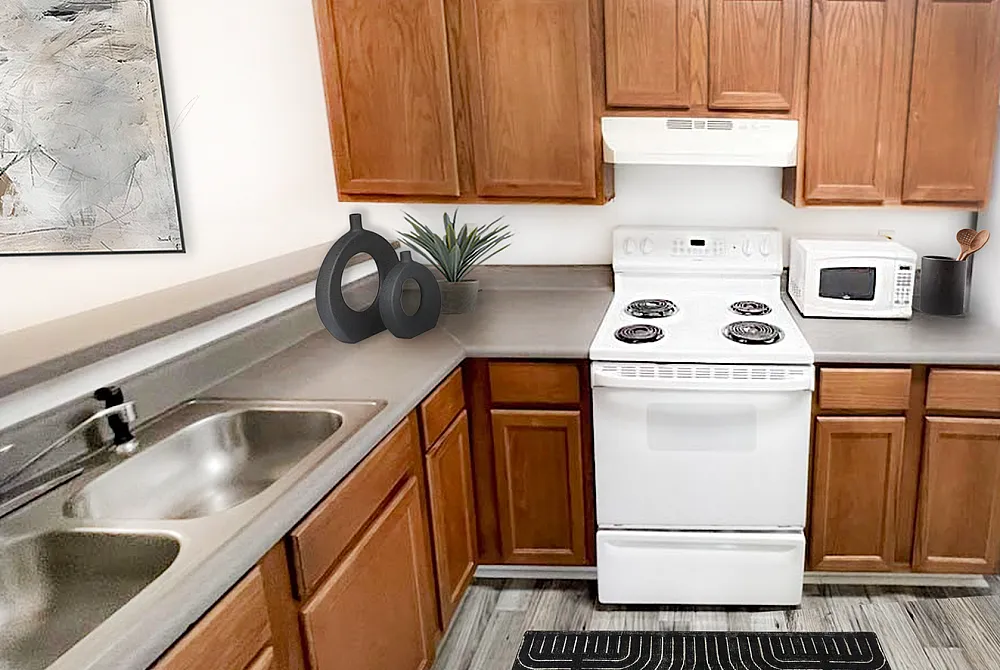 Modern kitchen with warm wood cabinets, sleek countertops, stainless steel double sink, and elegant decor.