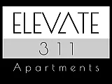 Stylish logo for Elevate 311 Apartments, featuring modern typography with a sleek black, white, and gray color scheme.