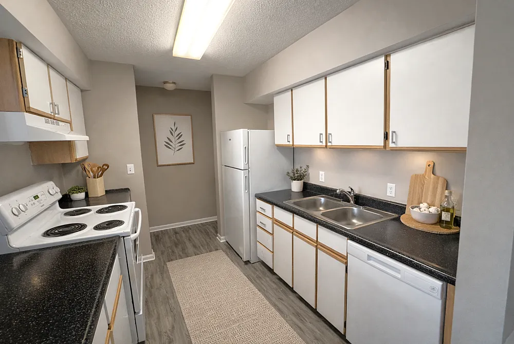 Charming kitchen with modern appliances, ample counter space, and elegant decor.