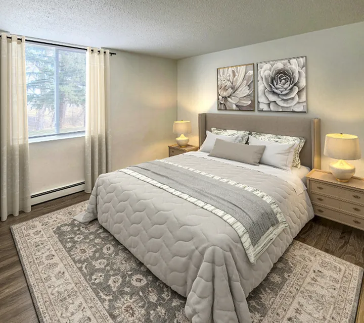 Cozy bedroom with elegant floral artwork, soft lighting, and a plush bed inviting relaxation.