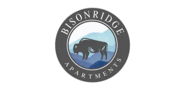 Logo of Bison Ridge Apartments featuring an artistic bison silhouette against a backdrop of rolling hills, conveying a sense of nature and elegance.
