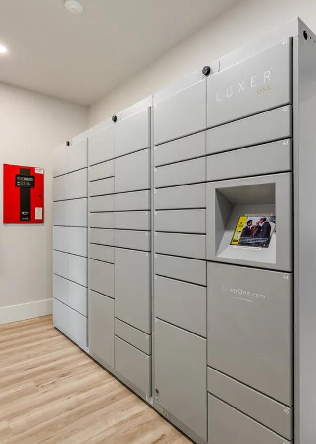 Modern parcel locker system with sleek design and secure storage, ideal for apartment convenience.