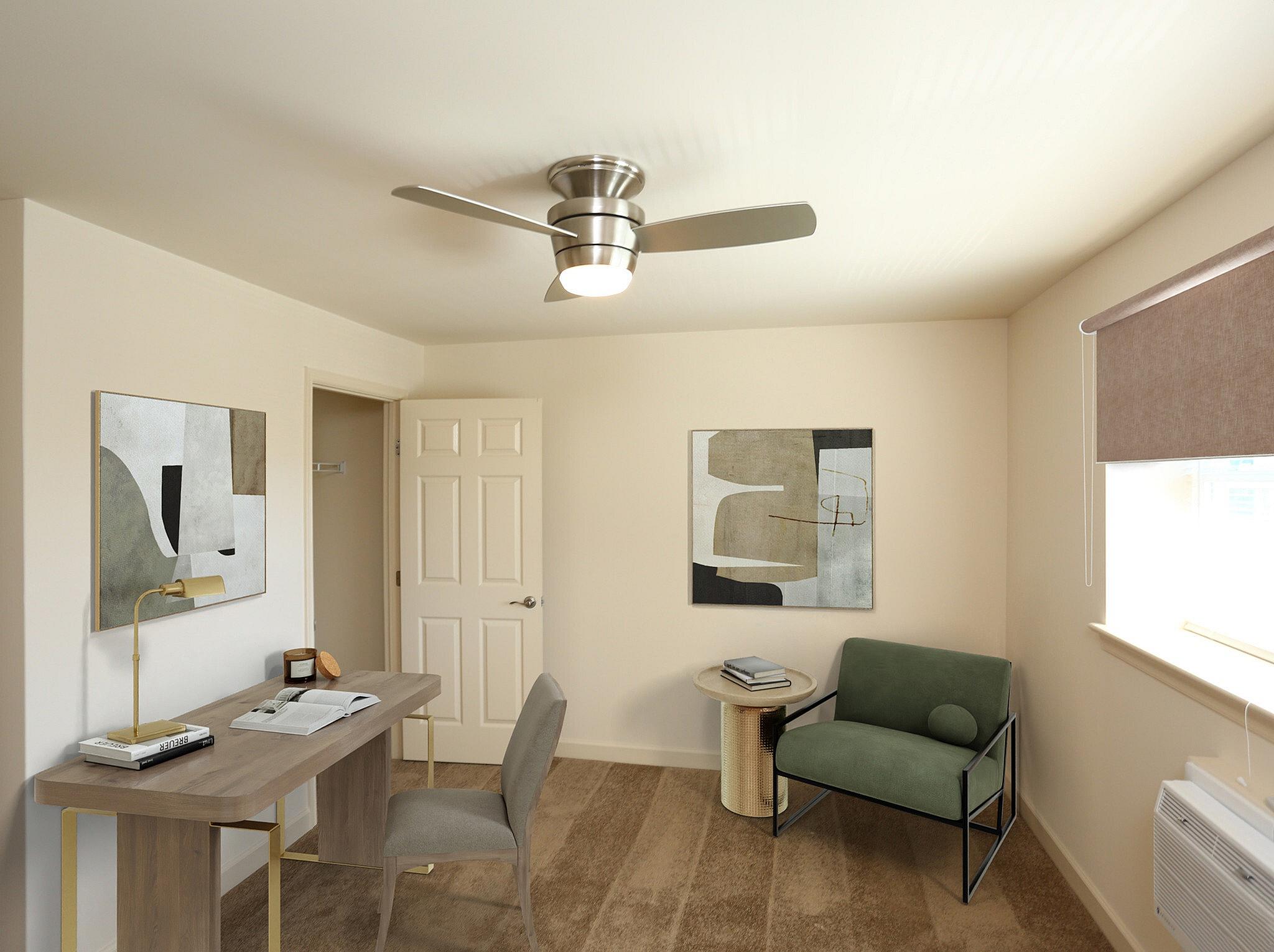 Chic home office with modern desk, stylish artwork, and cozy seating creating an inviting workspace atmosphere.