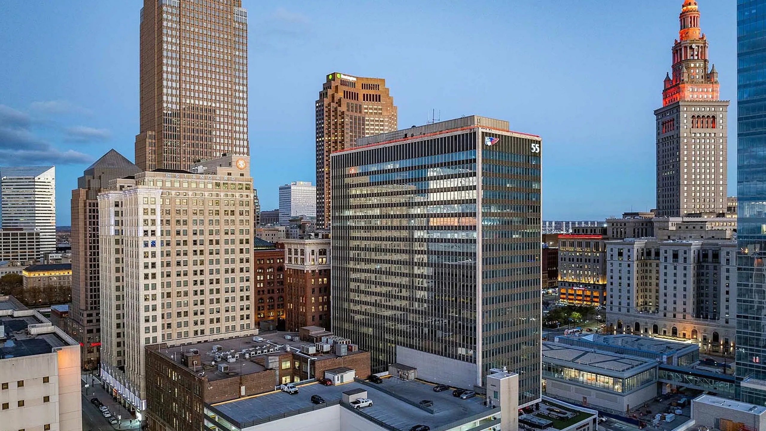 Dynamic city skyline view highlighting modern office buildings and iconic architecture.