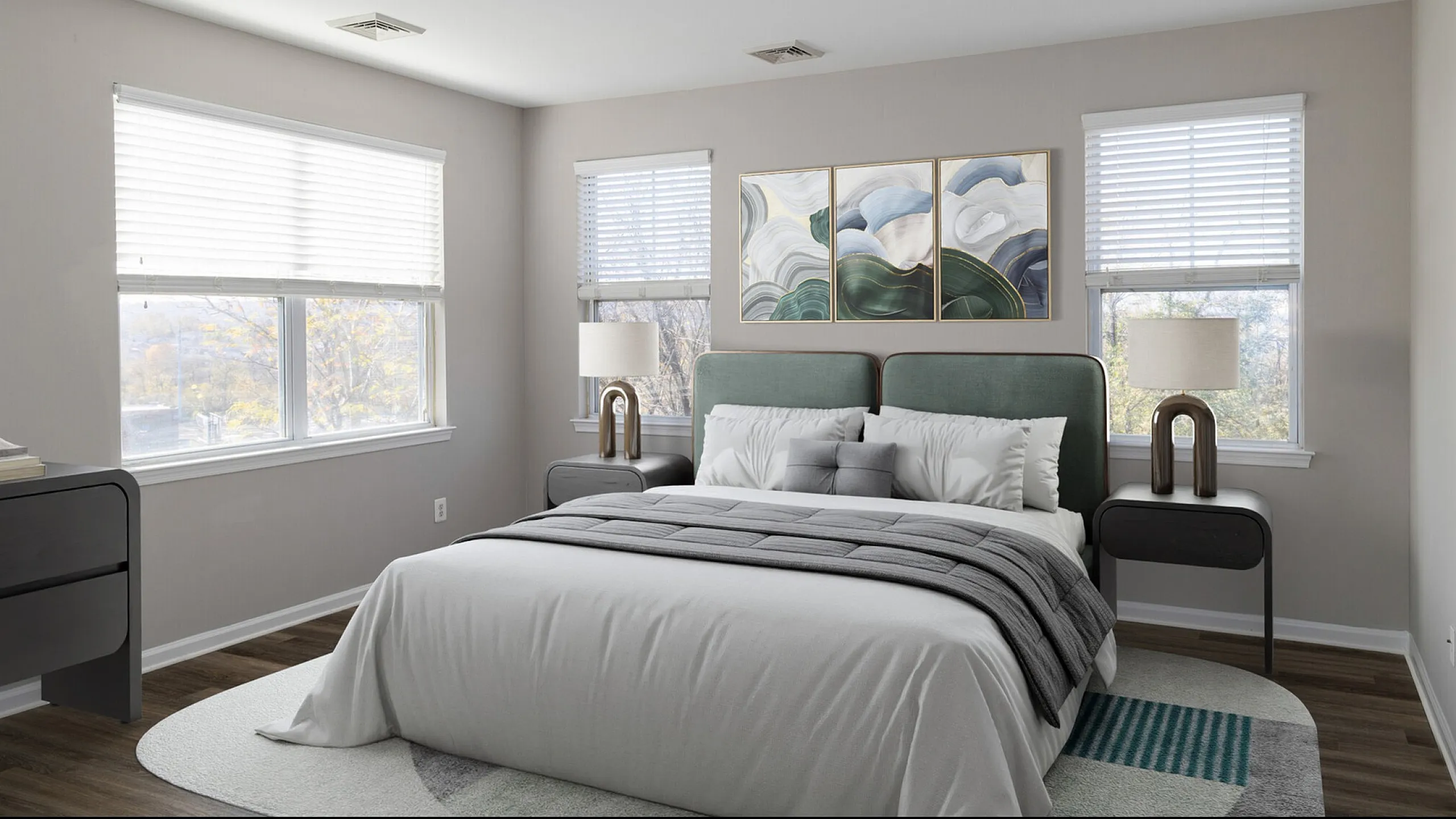 Bright and inviting bedroom with modern decor, featuring a plush bed, elegant side tables, and large windows offering natural light.