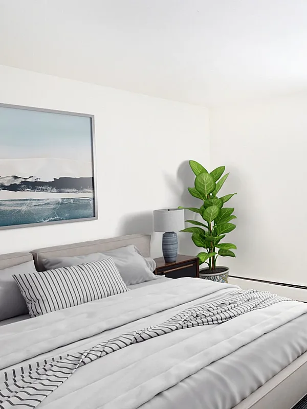 Bright and airy bedroom with modern decor, large window, and stylish wall art, promoting a serene and inviting atmosphere.