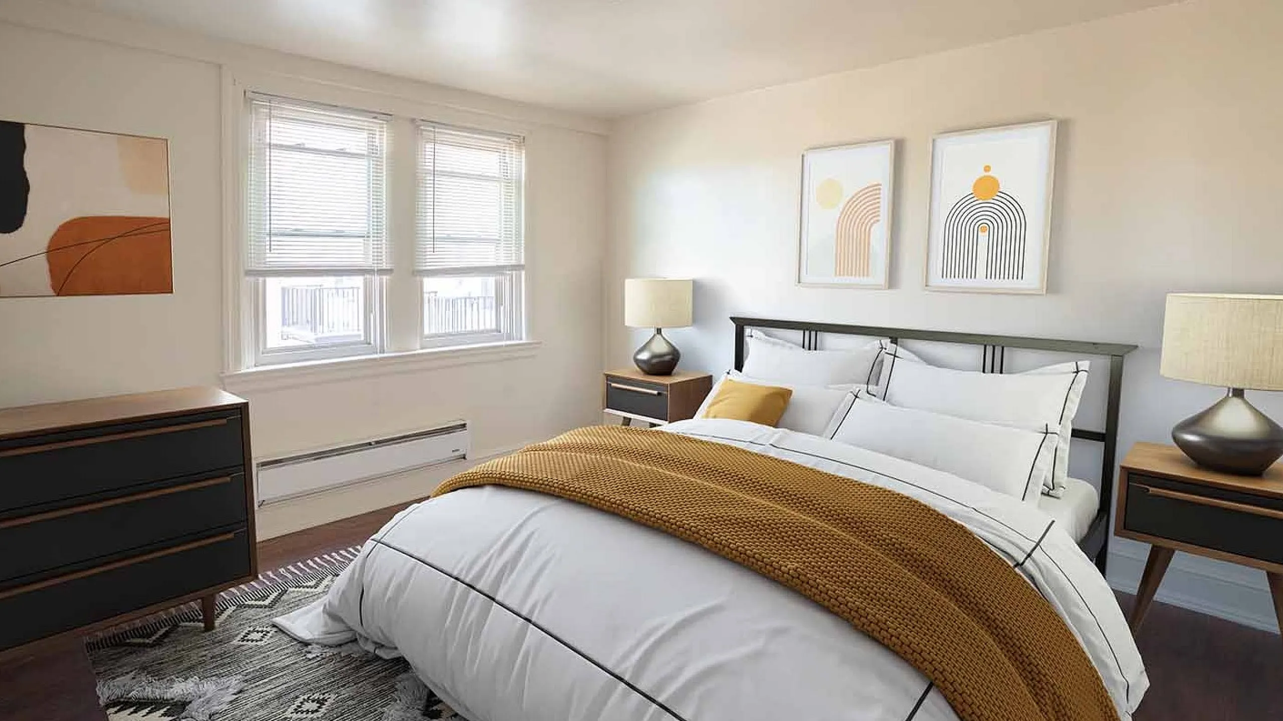 Bright and inviting bedroom with chic decor, featuring a comfortable bed, elegant artwork, and abundant natural light.