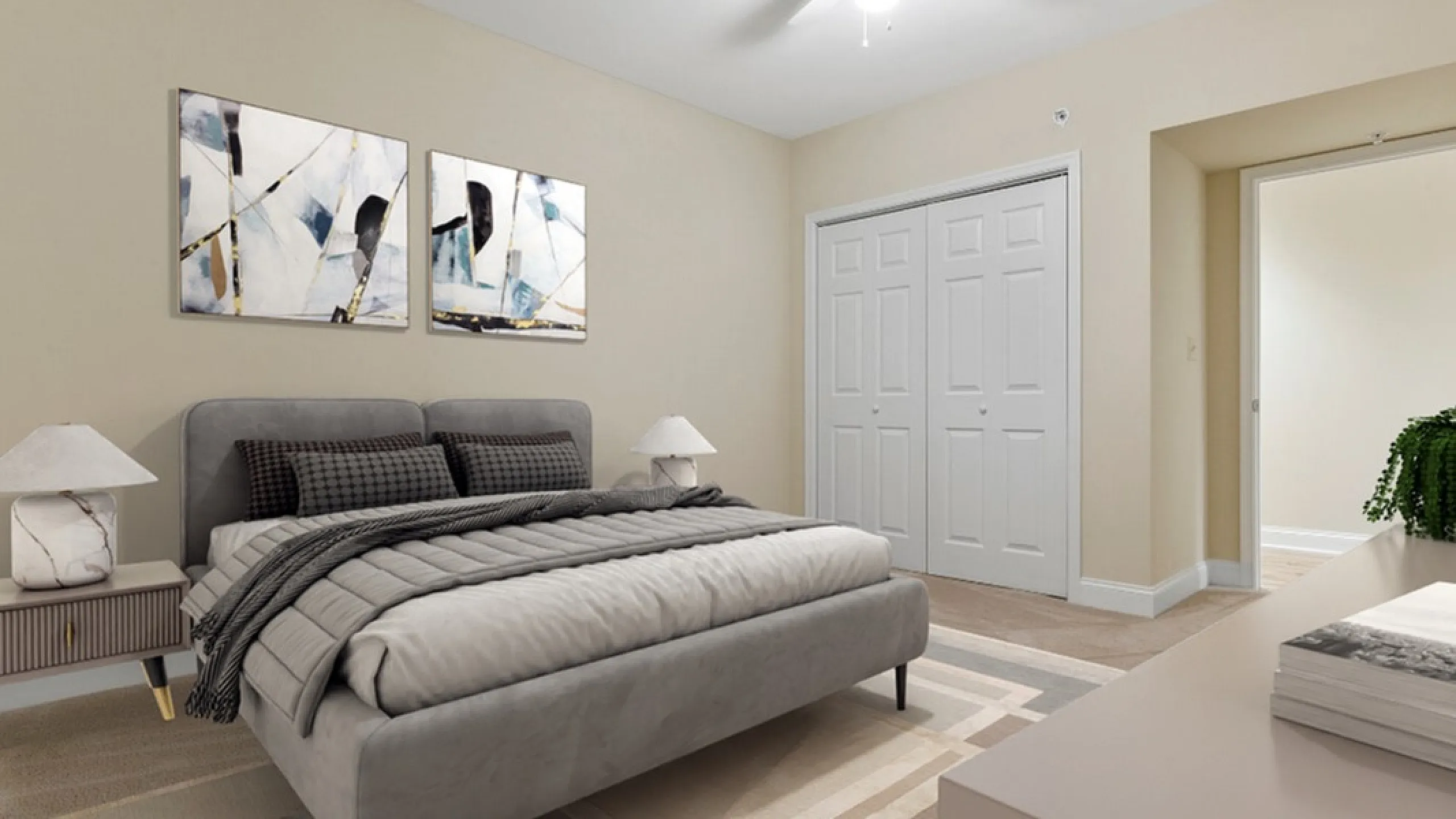 Inviting bedroom with chic decor, featuring a plush gray bed, contemporary art, and ample closet space.