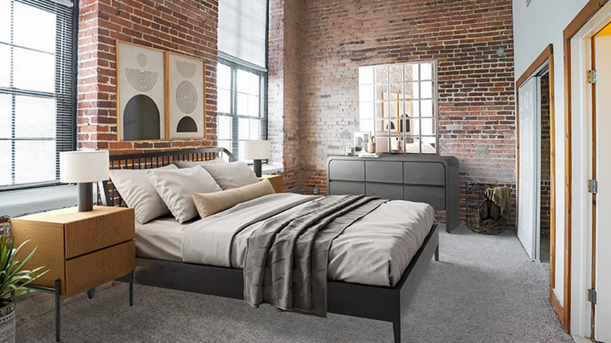 Chic industrial-style bedroom with exposed brick walls, large windows, modern artwork, and elegant furnishings.