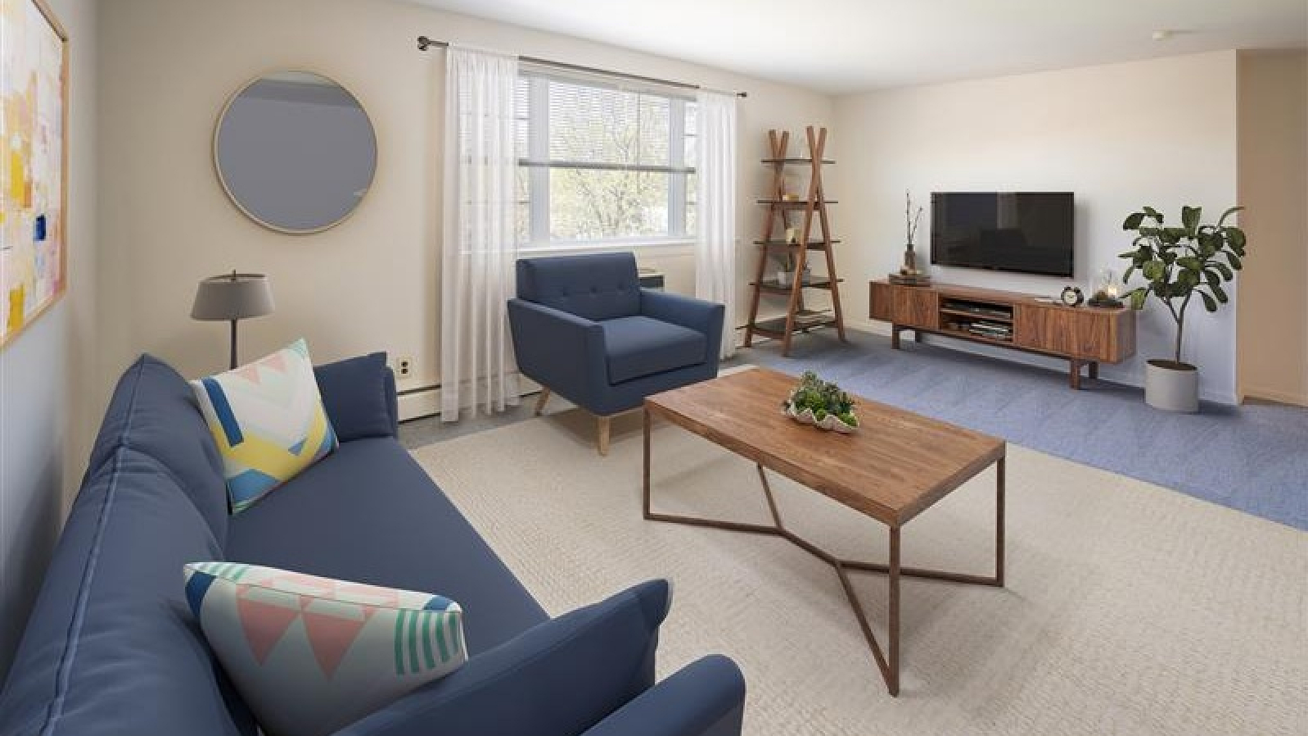 Modern living room with stylish blue furniture, wood accents, and abundant natural light, perfect for relaxation and entertainment.