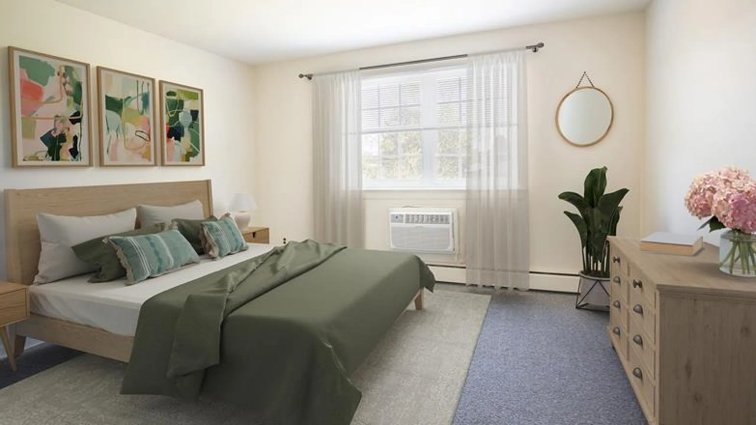 Elegant bedroom with a modern design, featuring a cozy bed with green bedding, stylish decor, and natural light from a large window.