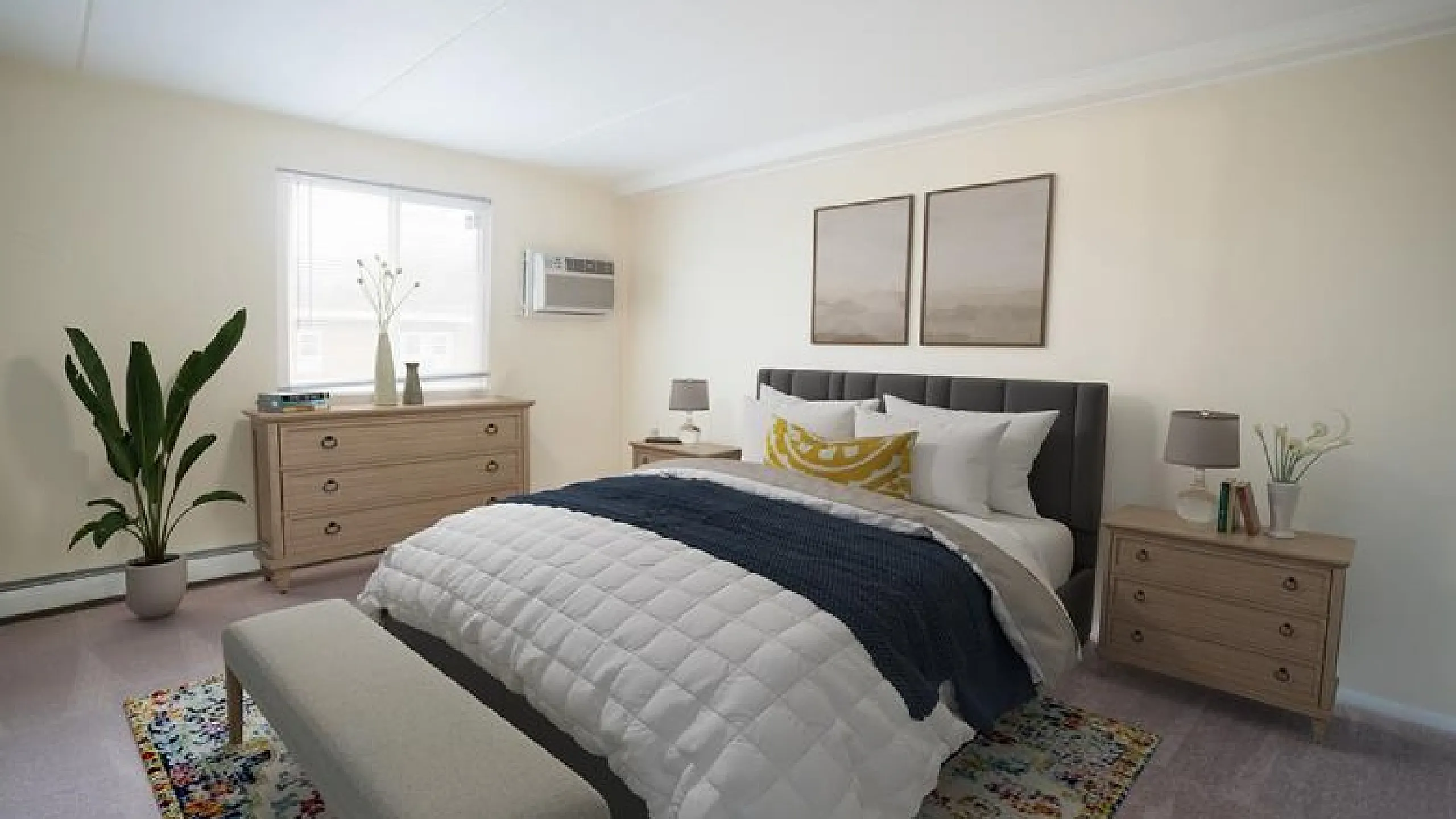 Inviting bedroom with cozy queen bed, stylish decor, and abundant natural light, perfect for relaxation.