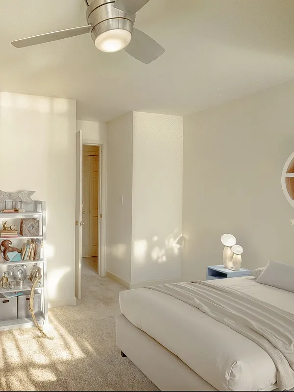 Bright and inviting bedroom with plush carpet, elegant decor, and sunlit ambiance perfect for relaxation.