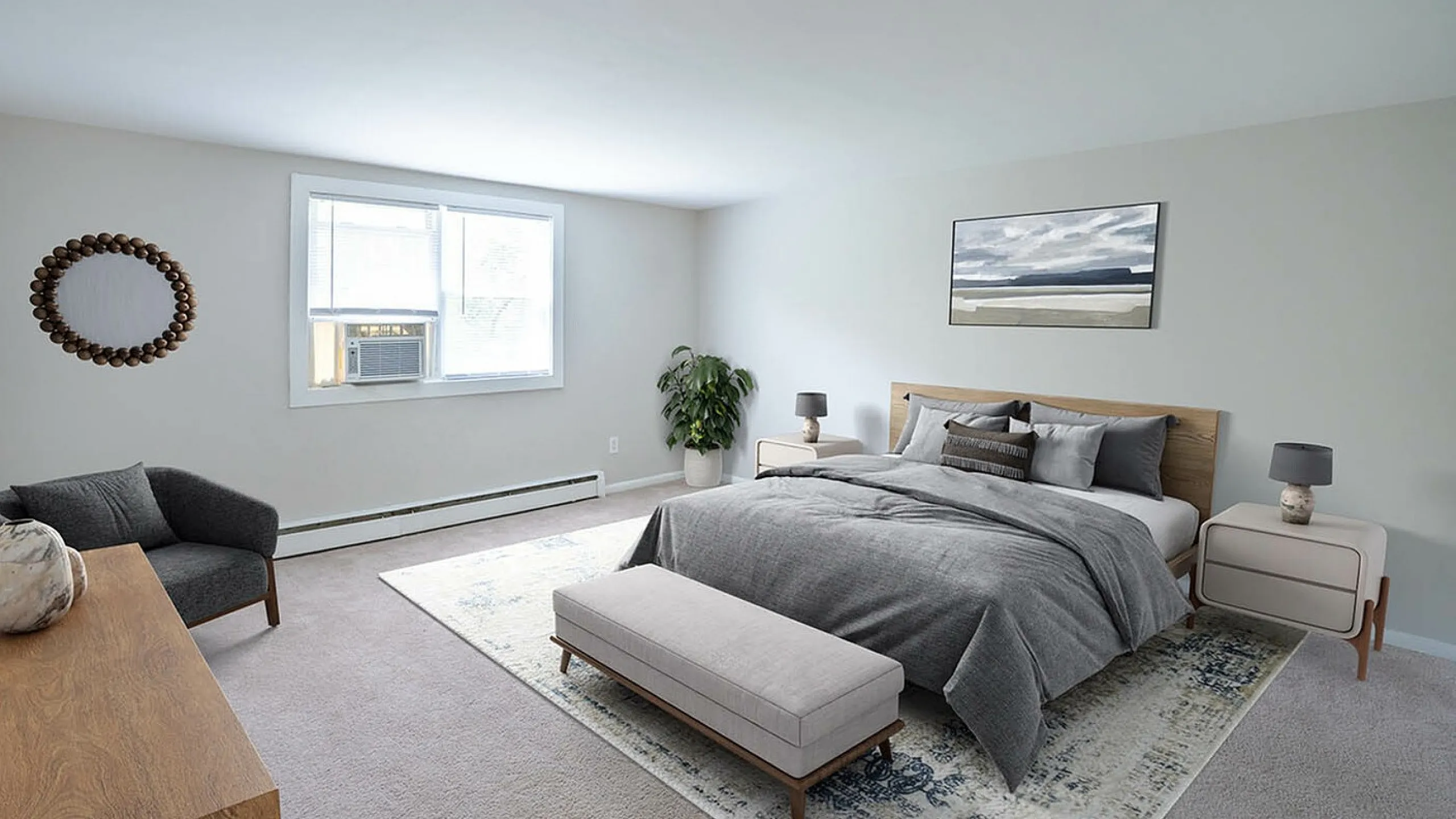 Elegant bedroom with a plush bed, chic gray decor, and warm natural light, creating a serene retreat.