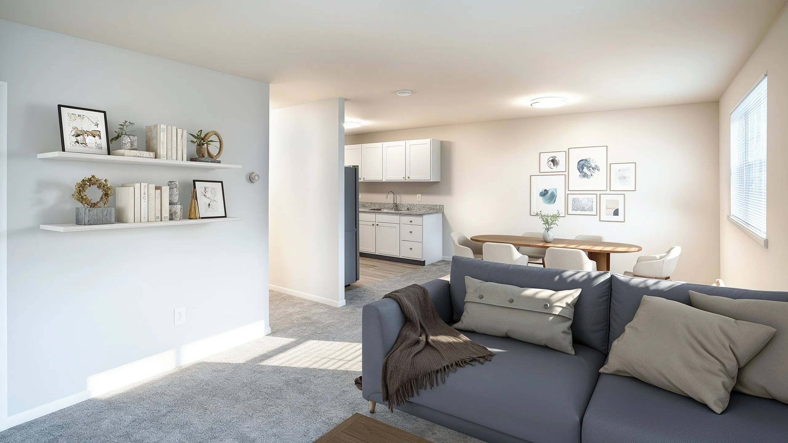 Bright and inviting living space with comfortable seating, elegant decor, and an open kitchen-dining area in a modern apartment.