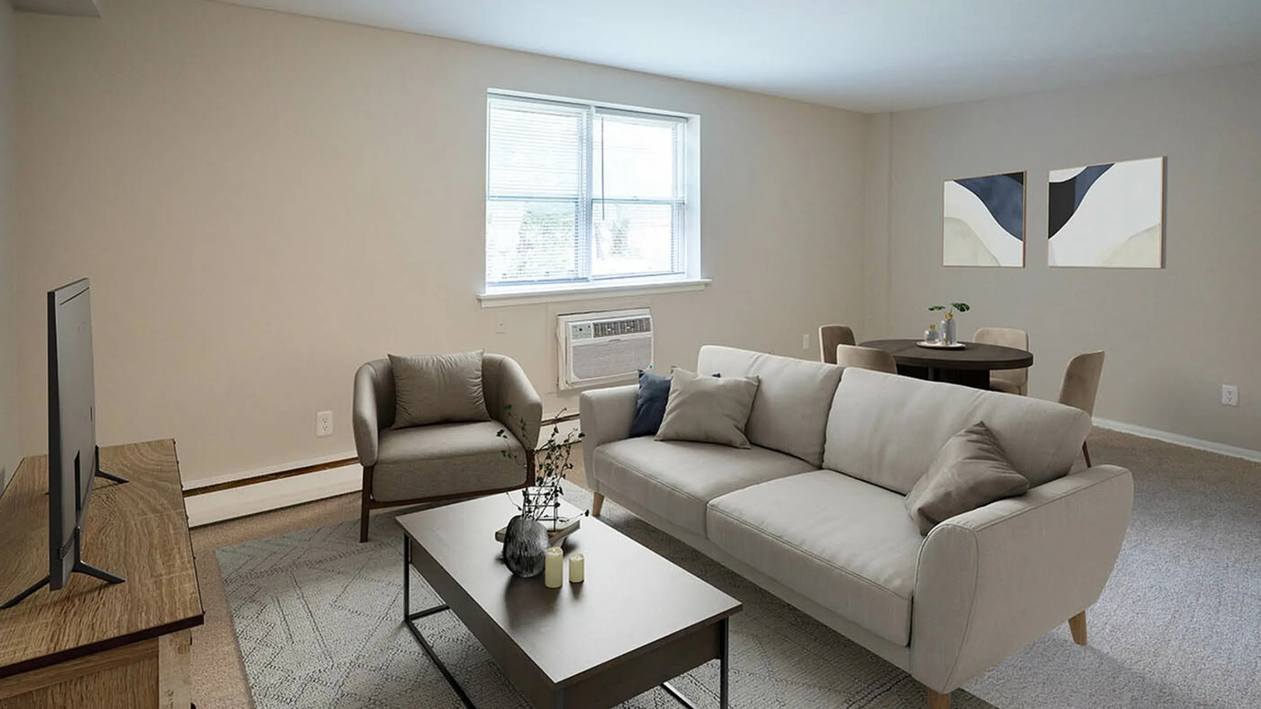 Bright and cozy living room featuring a modern sofa, stylish coffee table, sleek TV stand, and elegant dining area with contemporary wall art.