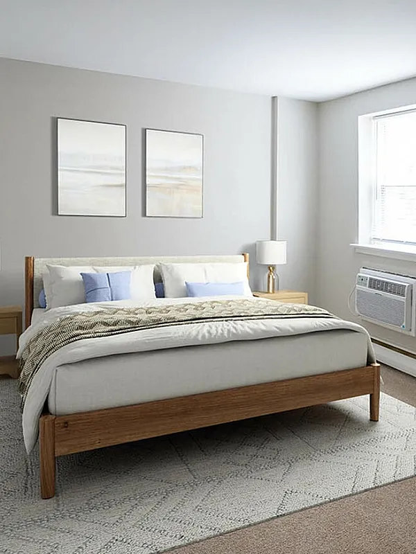 Elegant bedroom with a modern wooden bed, soft neutral tones, cozy carpet, and stylish decor.