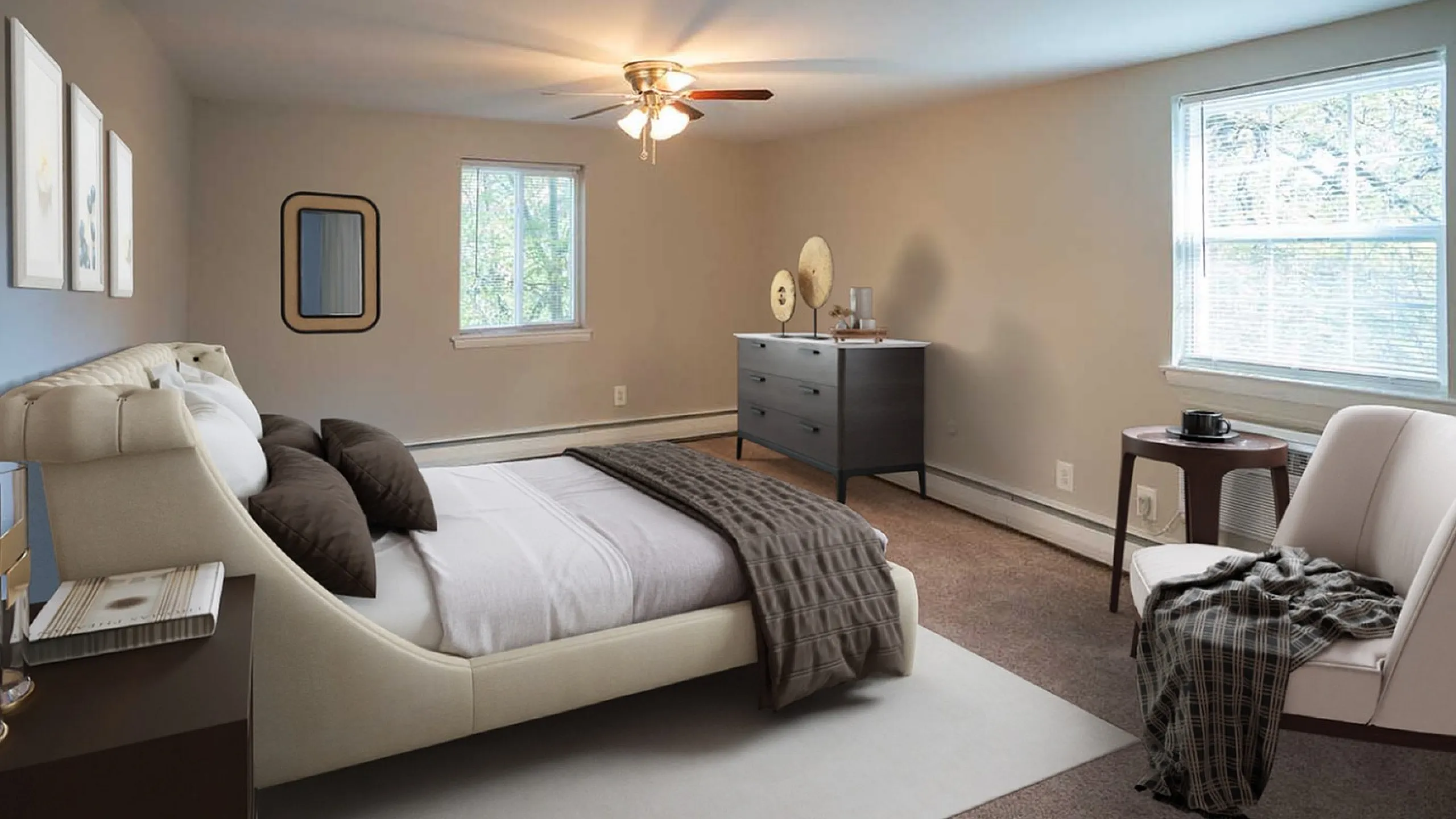 Inviting bedroom with elegant decor featuring a plush bed, cozy armchair, modern dresser, and abundant natural light.