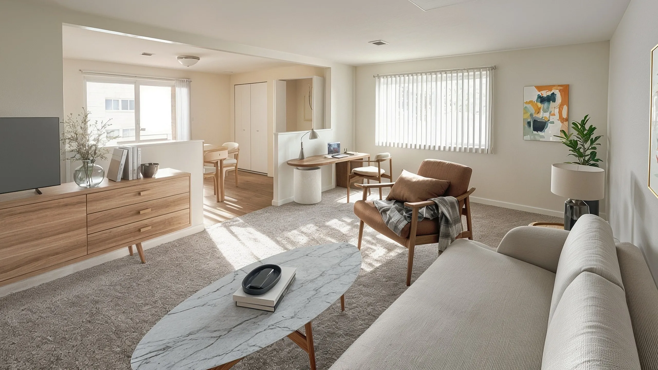 Bright and modern living room featuring a cozy sofa, sleek marble coffee table, and stylish wooden furniture with abundant natural light.