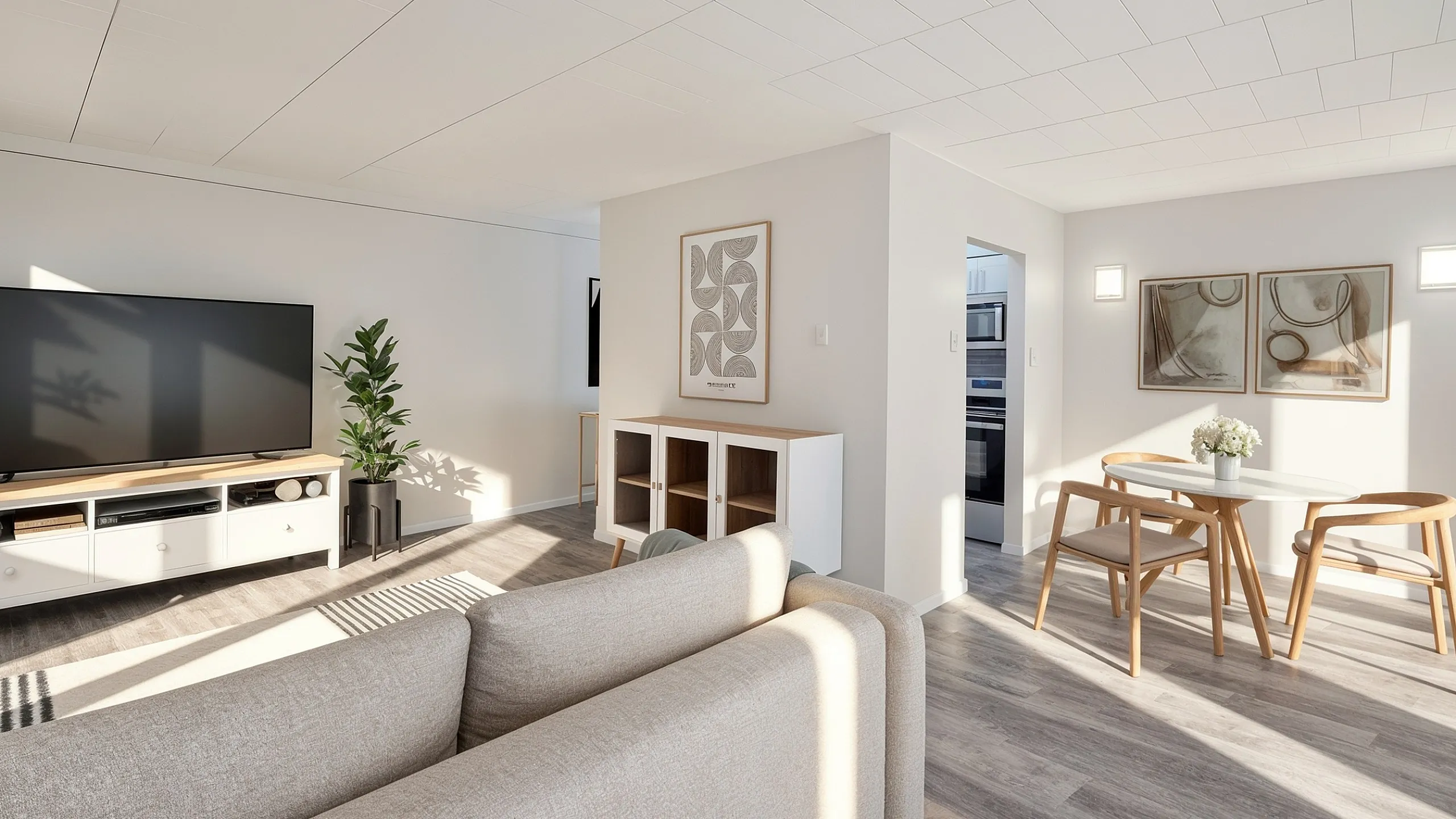 Bright and modern living room with sleek furniture, a cozy dining area, and natural light streaming through the windows.