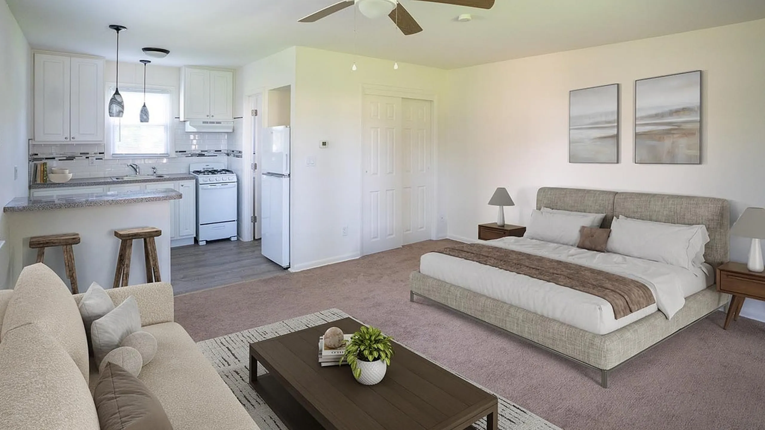 Modern open-concept apartment featuring a cozy bedroom, stylish living room, and sleek kitchen with breakfast bar.