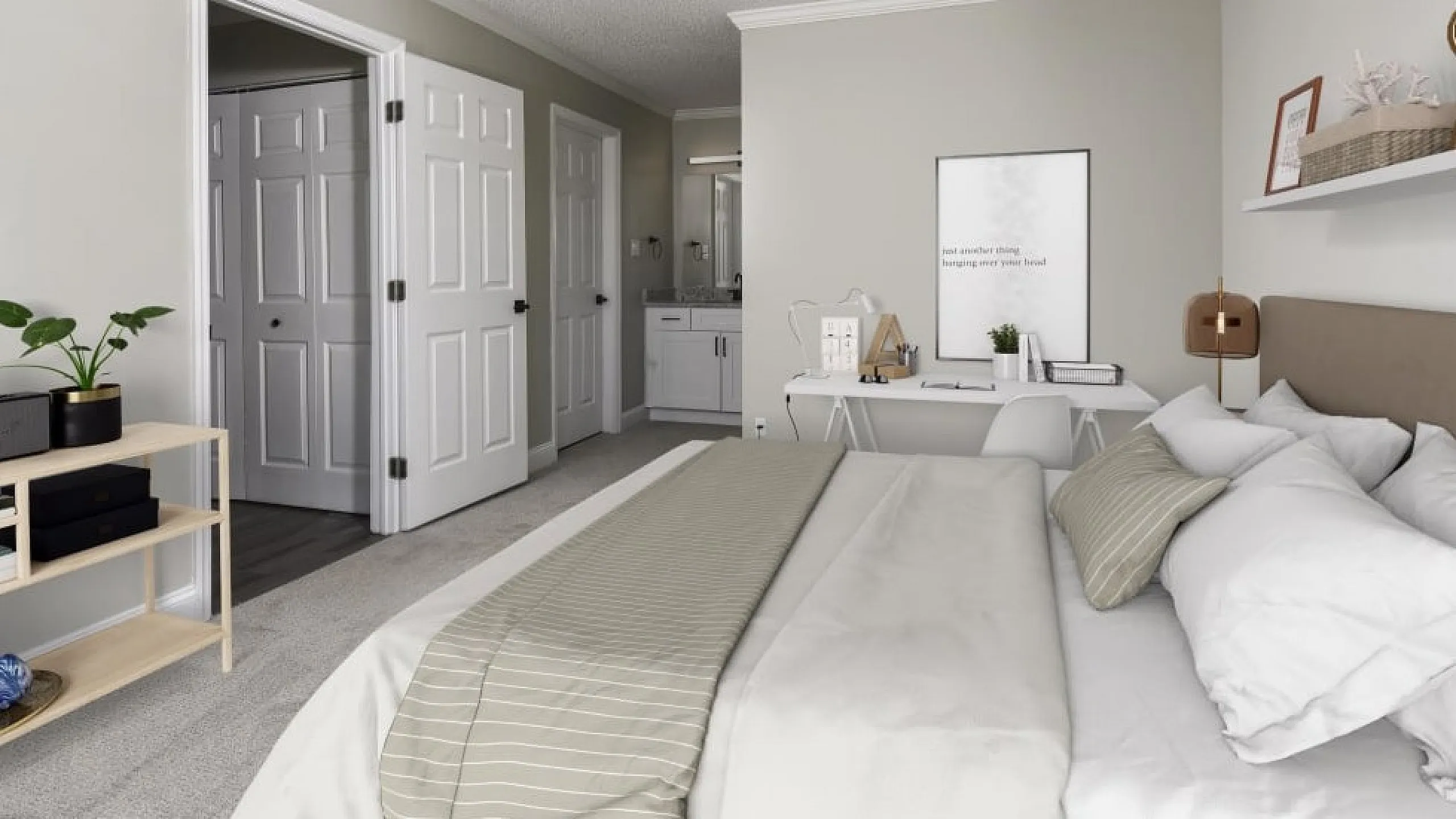 Cozy bedroom with elegant decor, featuring a comfortable bed, sleek workspace, and modern closet doors.
