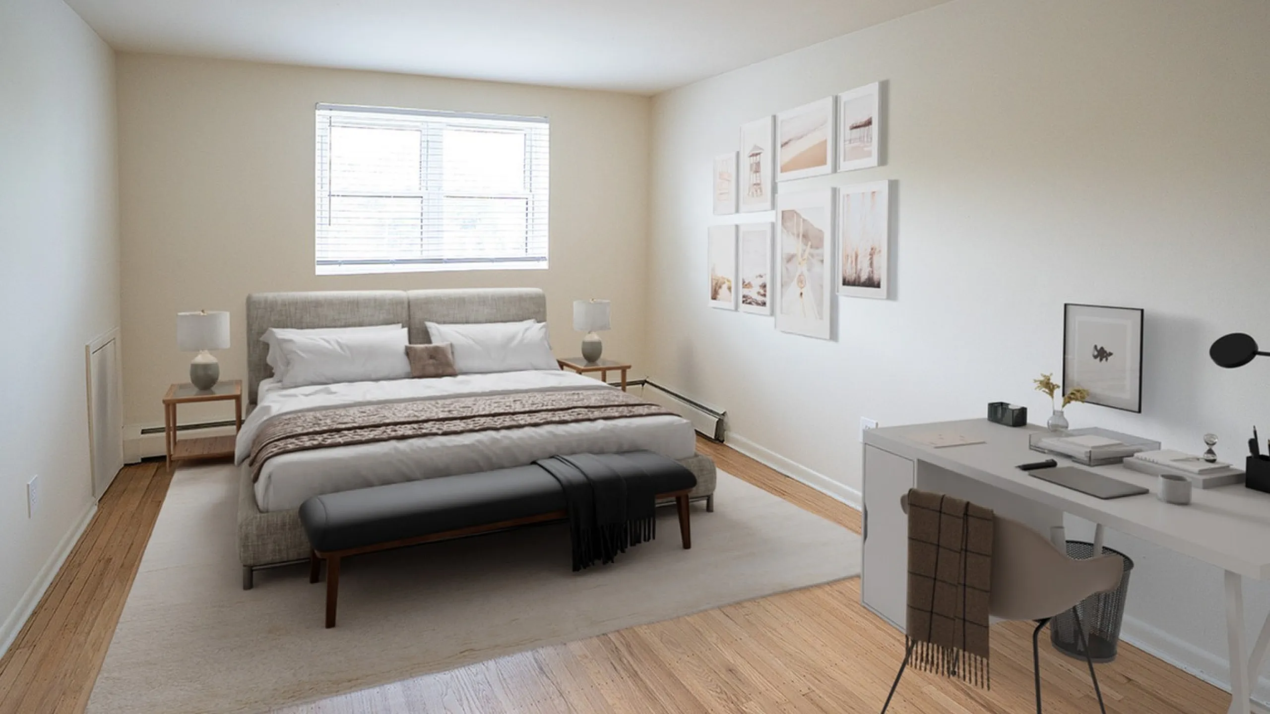 Elegant bedroom with large windows, stylish decor, and a cozy workspace, offering a tranquil retreat.