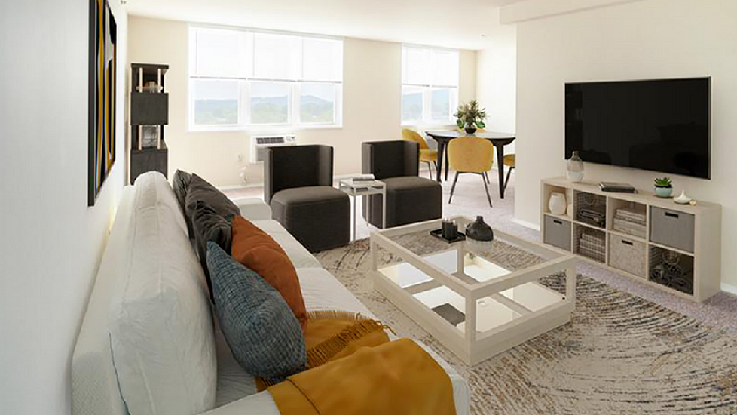 Bright and inviting living room with modern decor, plush seating, and a large flat-screen TV; dining area with elegant chairs and abundant natural light.