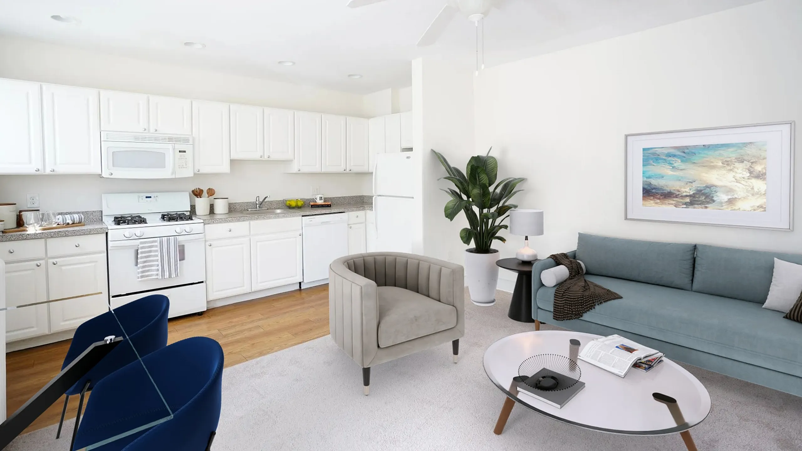 Modern open-concept living space with sleek kitchen, elegant furnishings, and vibrant artwork, perfect for urban living.