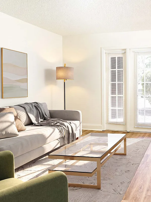 Bright and inviting living room featuring a cozy fireplace, stylish decor, and elegant wooden flooring, perfect for relaxation.