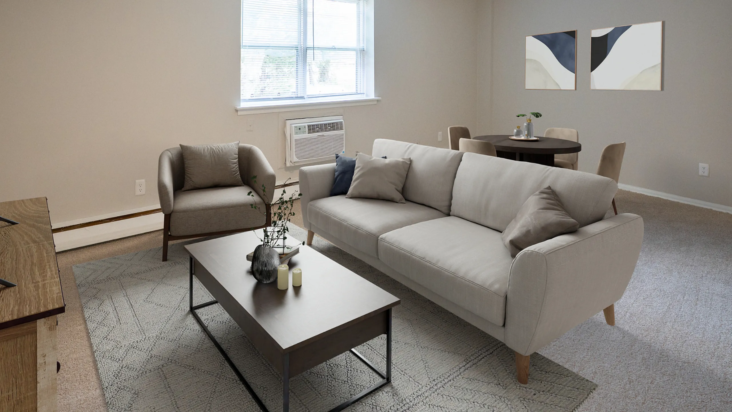 Inviting living room with modern sofa, chic armchair, and stylish coffee table, bathed in natural light from a large window.