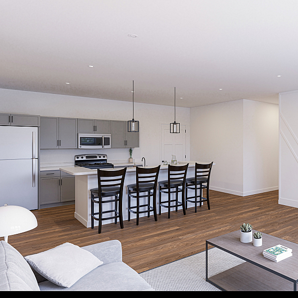 Modern open-concept living space featuring a stylish kitchen with peninsula seating, sleek TV setup, and cozy living area enhanced by wood flooring and elegant finishes.