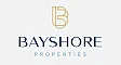 Elegant Bayshore Properties logo featuring a modern gold and navy blue design.