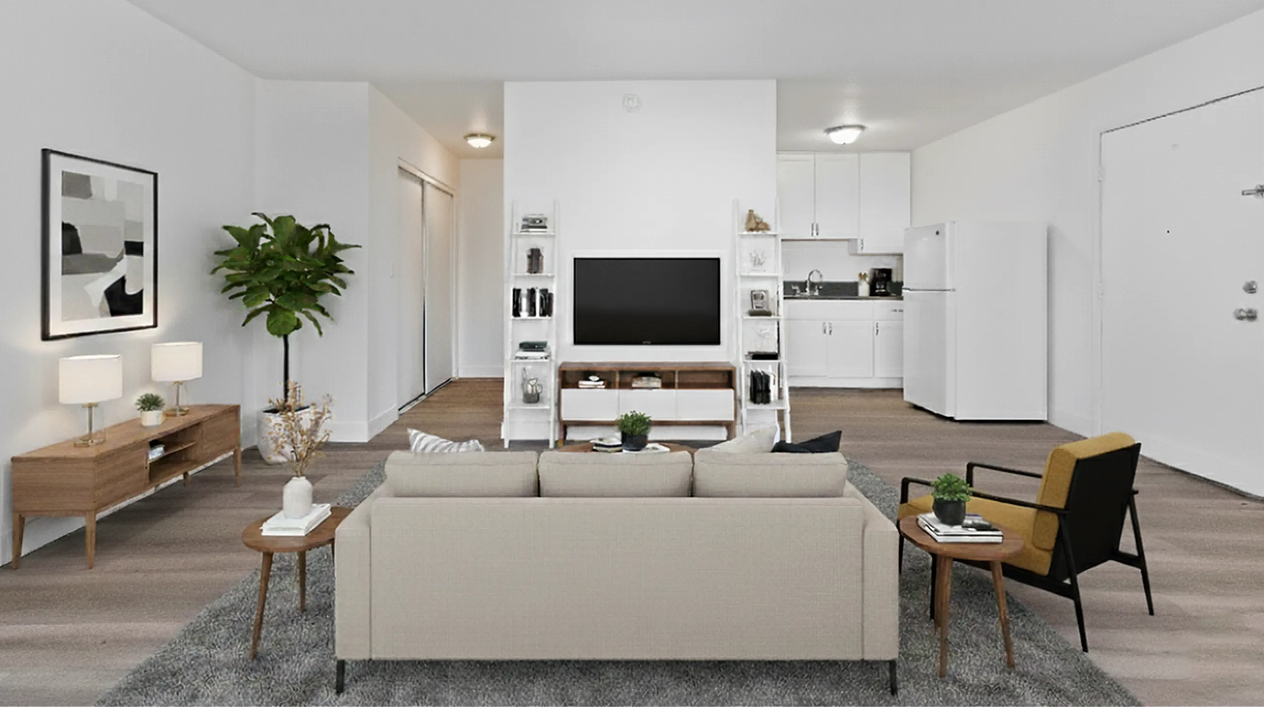 Modern living room with sleek furniture, flat-screen TV, and an open kitchen layout accented by stylish decor and a vibrant indoor plant.