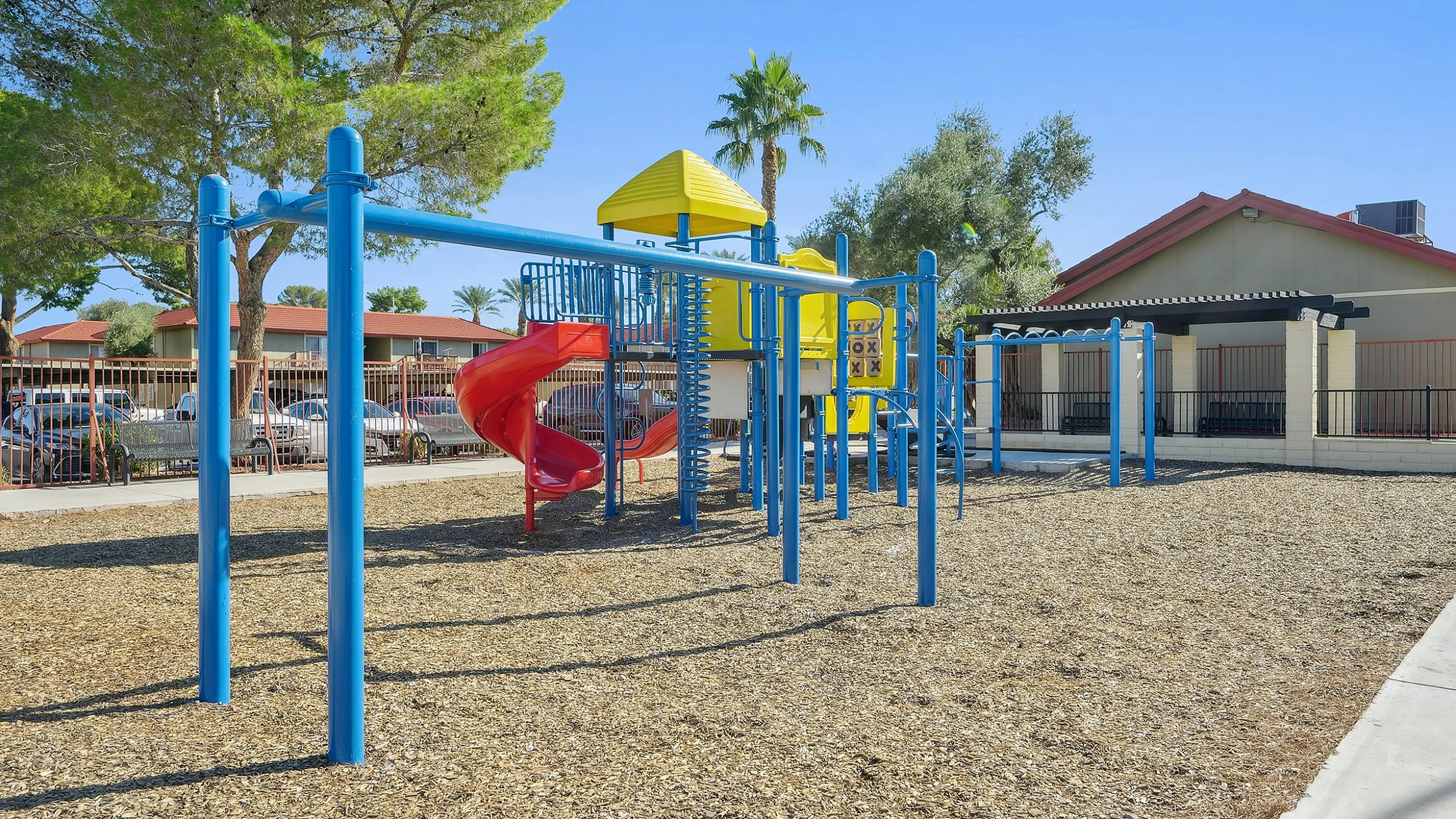 Inviting playground area with vibrant play structures, perfect for community fun and family enjoyment.