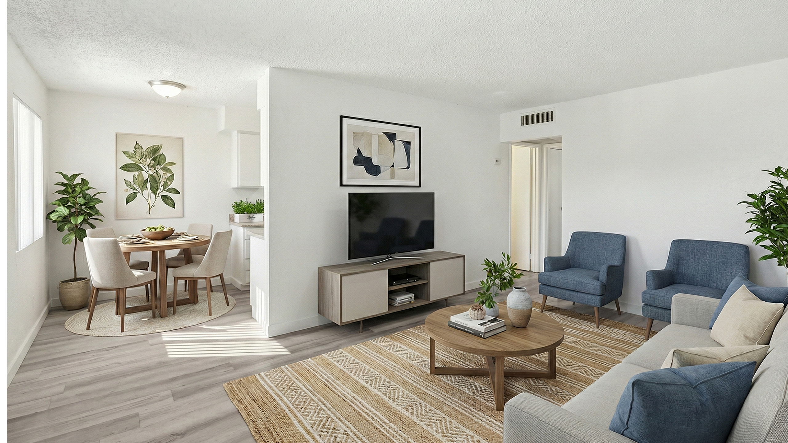Modern living room with sleek furniture, light wood flooring, and lush greenery, seamlessly connected to a cozy dining area with elegant decor.