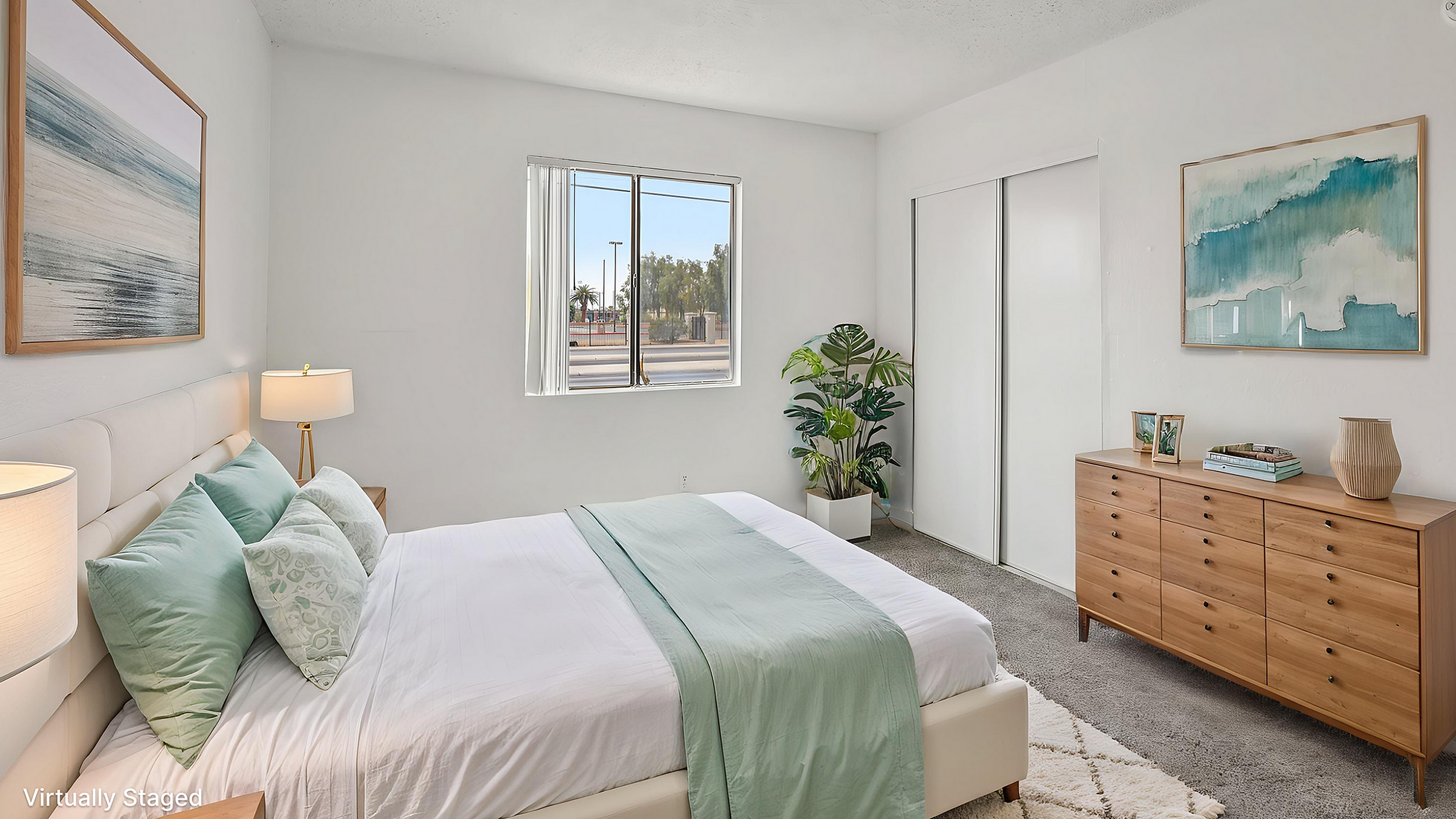 Bright and inviting virtually staged bedroom featuring a cozy queen bed, elegant wooden dresser, and serene artwork, with abundant natural light pouring through the window.