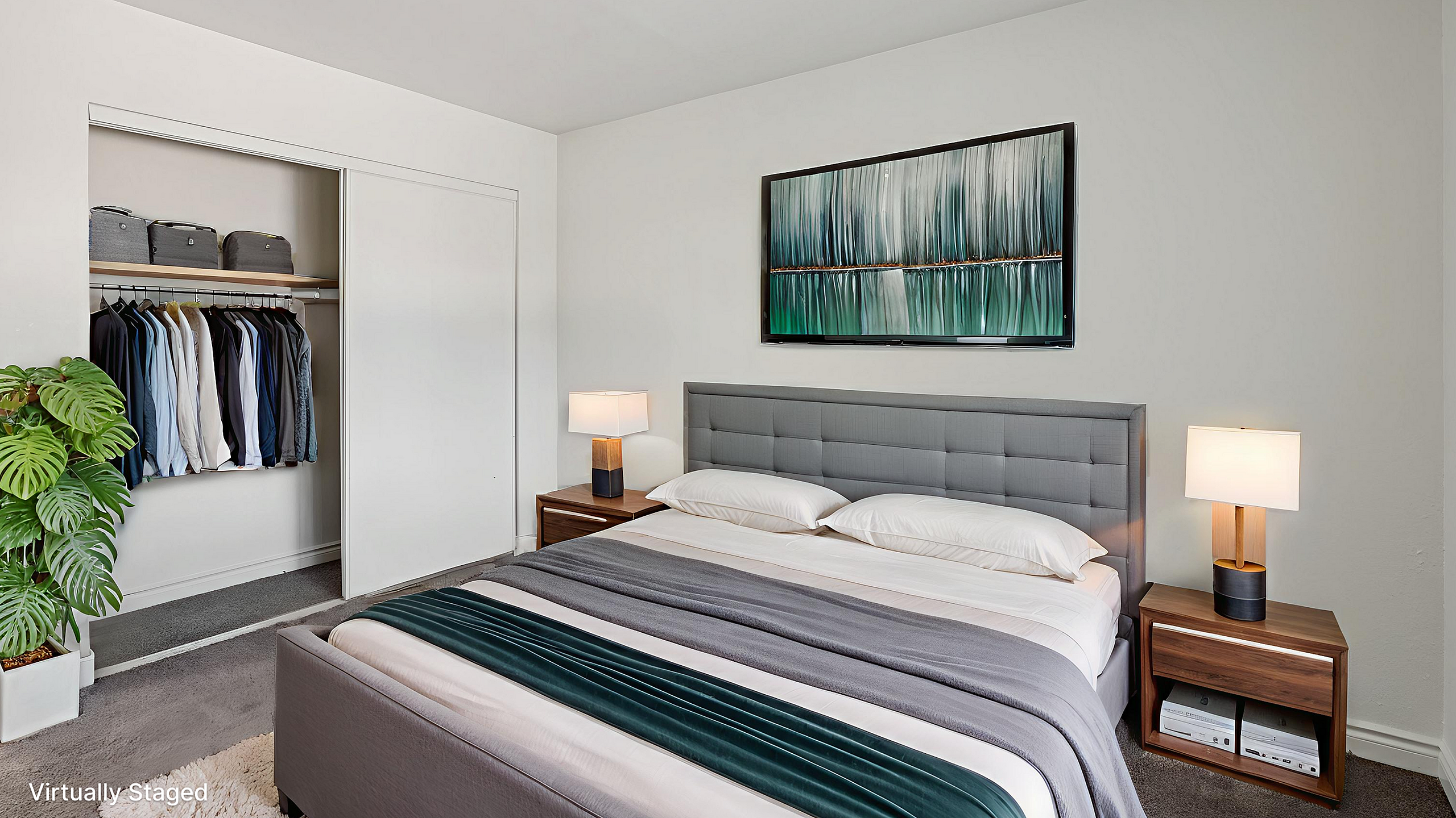 Elegant bedroom with modern decor featuring a plush bed, stylish artwork, and a neatly organized open closet.