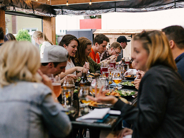 group of people dining outdoors