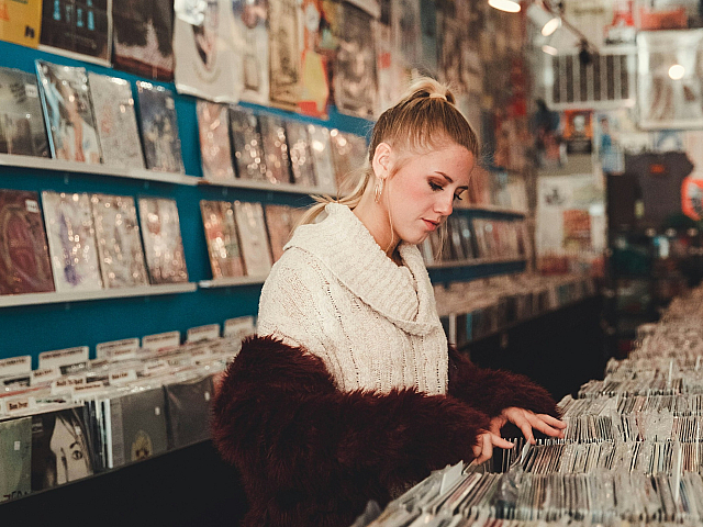 woman at a record shop