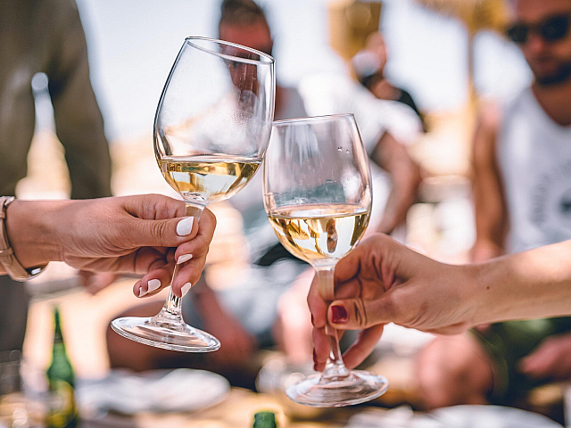 toasting with white wine