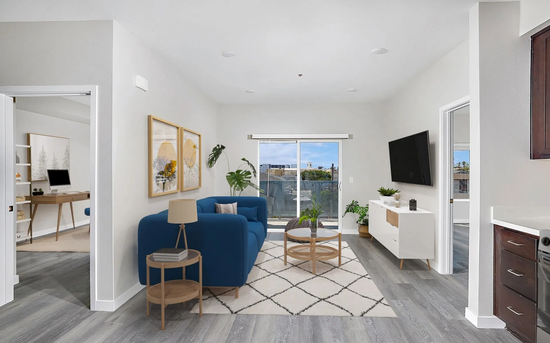 living room with round coffee table and balcony