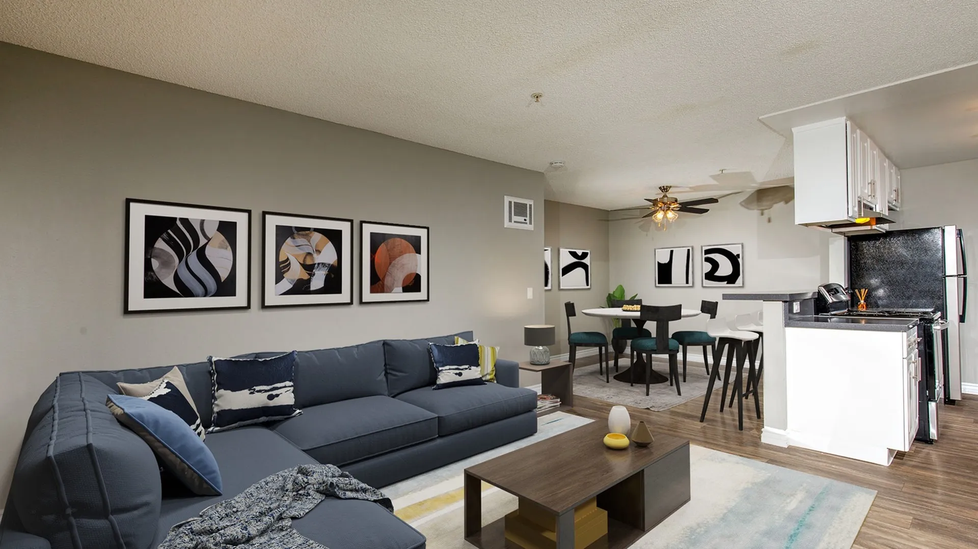 virtually staged apartment living room, kitchen and dining area
