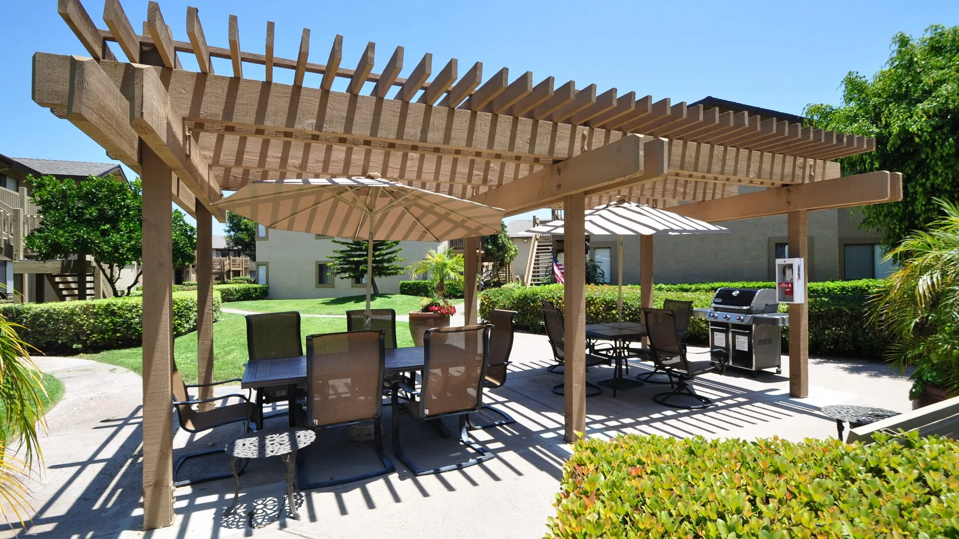 Orchard outdoor grill and picnic area with umbrella