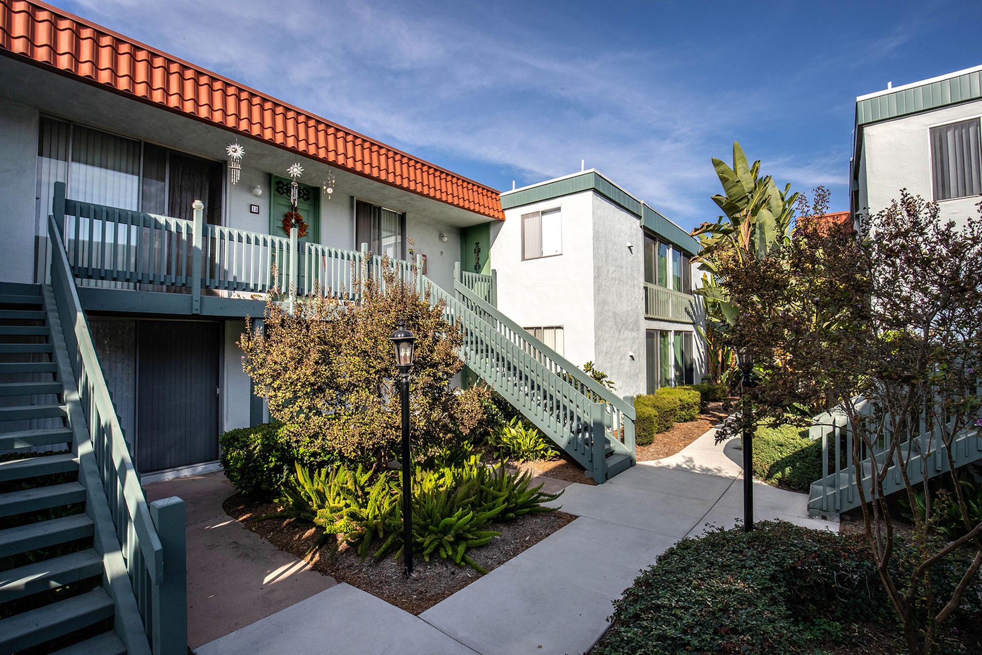 Castilian exterior with lush landscaping